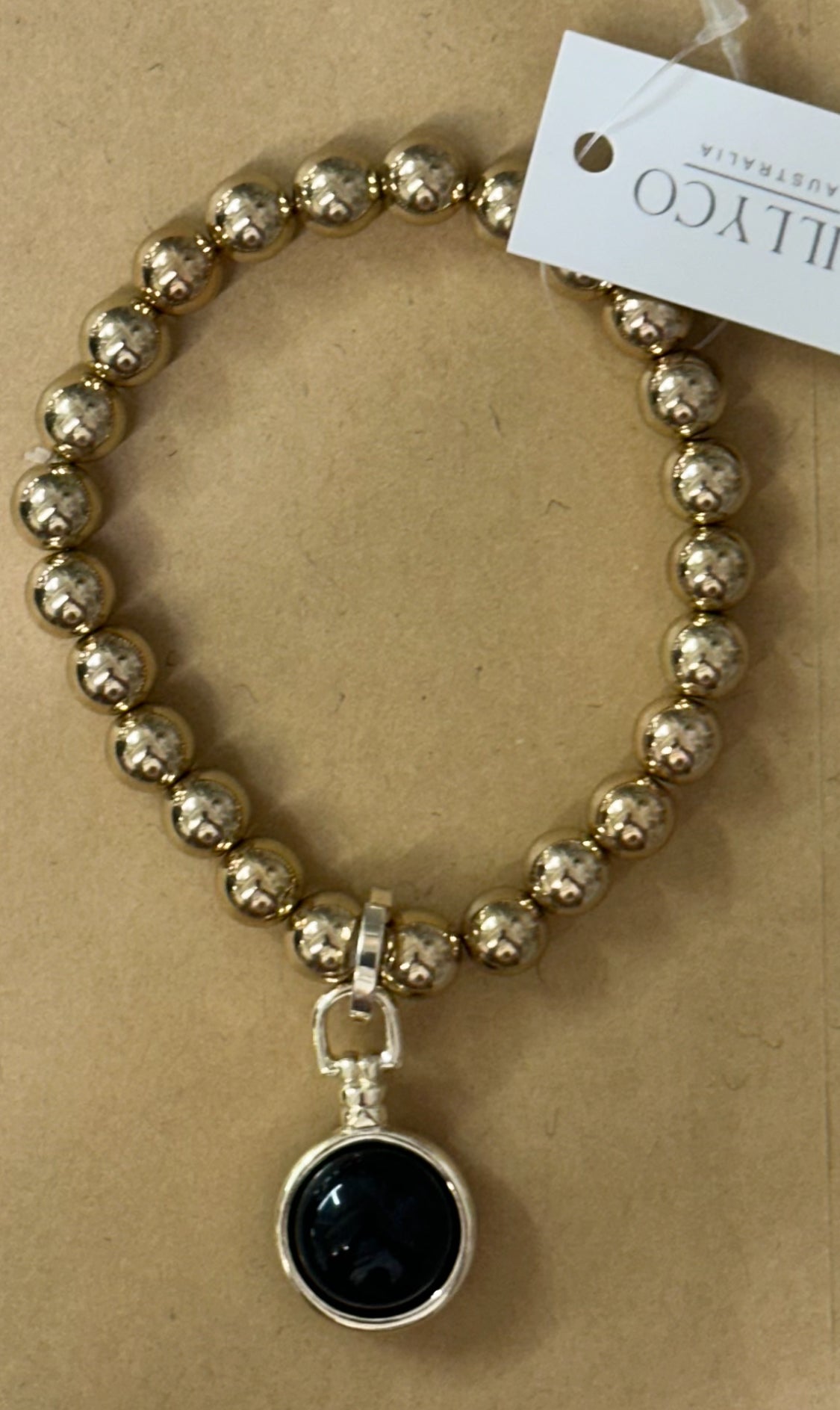 Gold Bracelet with Black Ball